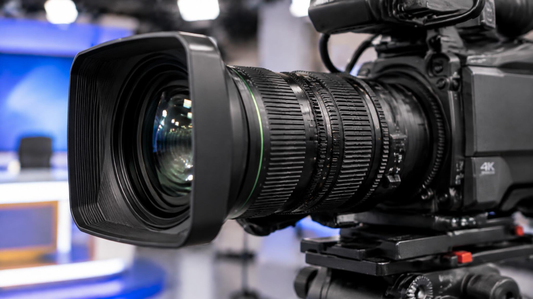 Close up of a broadcast camera lens with focus ring